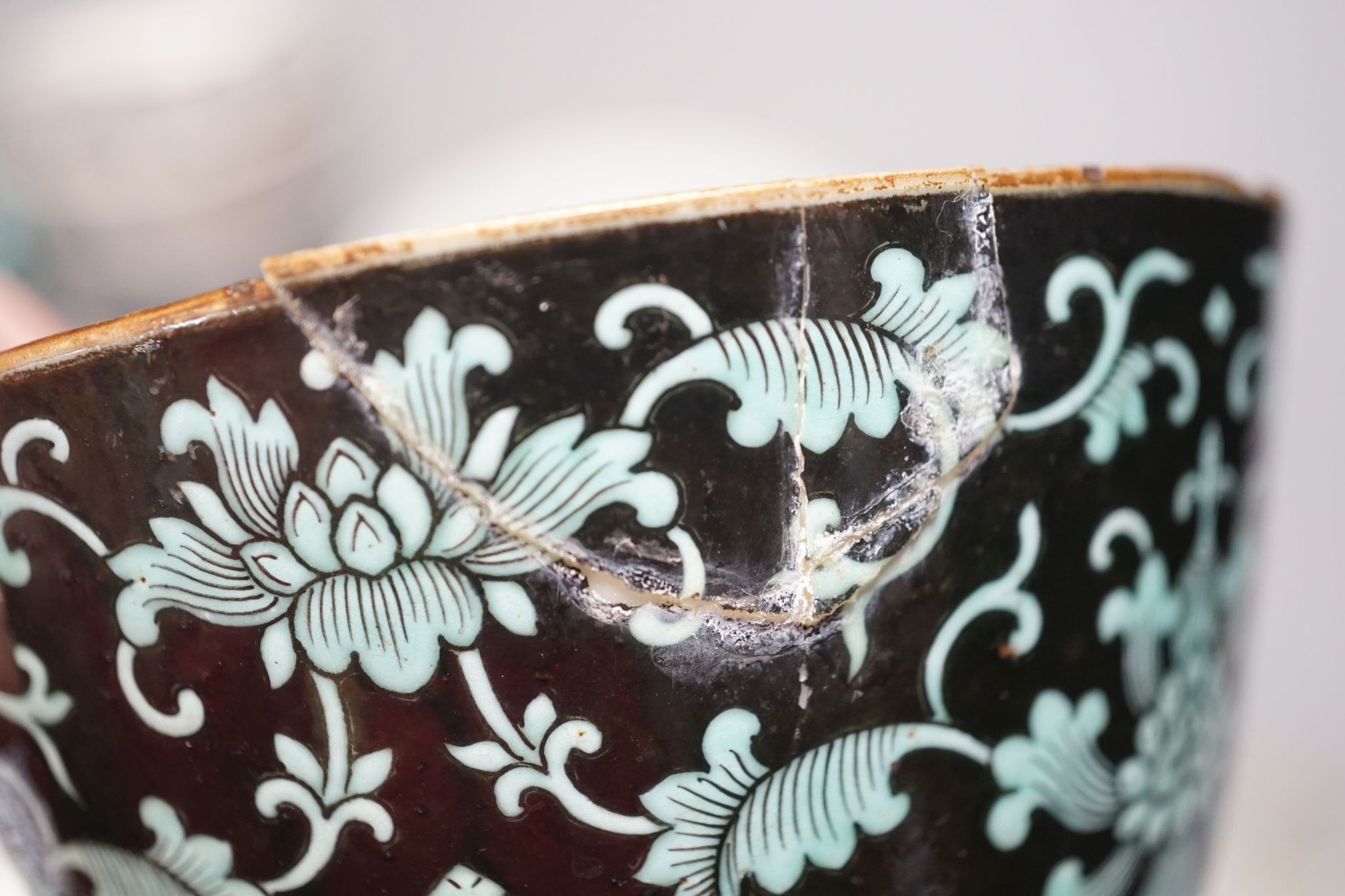 A 19th century Chinese black ground porcelain bowls and two covers, together with an three onion pattern blue and white tea bowls and saucers a/f